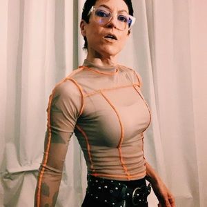 Noctex sheer top beige with orange stitching